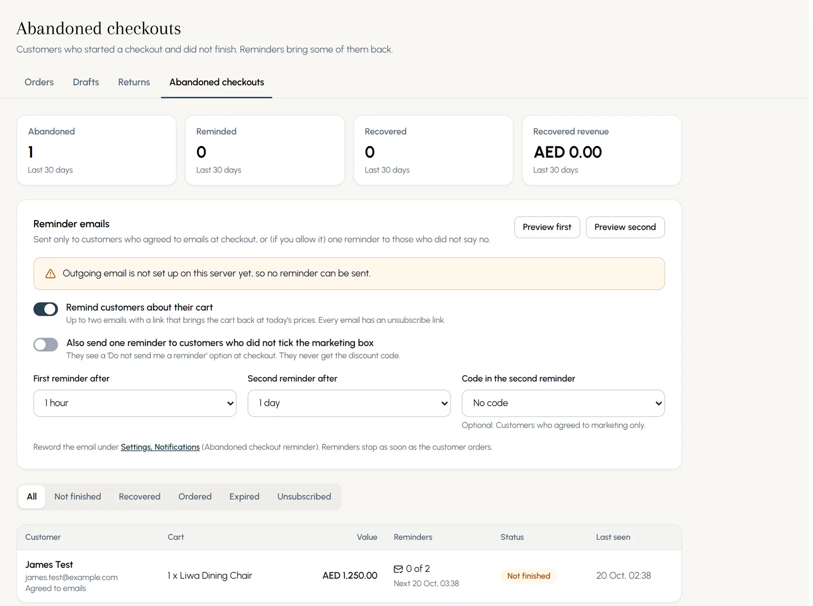 Abandoned checkouts: counters for abandoned, reminded, recovered and recovered revenue, the reminder settings, and one checkout from James Test not finished with a reminder due.