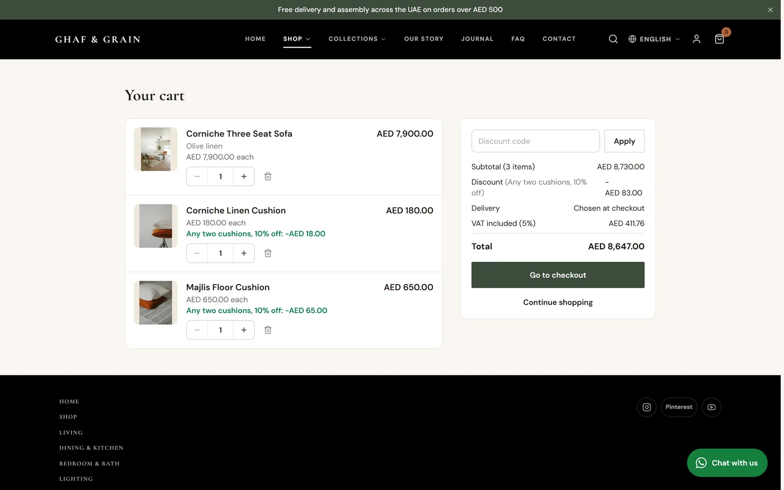 The cart page with the sofa and two cushions, the discount code box, subtotal, discount, VAT and the Go to checkout button.